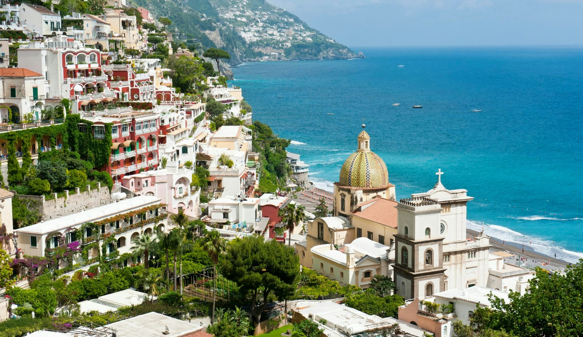 View of Positano with Chiesa di Santa Maria Assunta Church, Positano, Salerno, Amalfi Coast, Campania, Italy - stock photo
